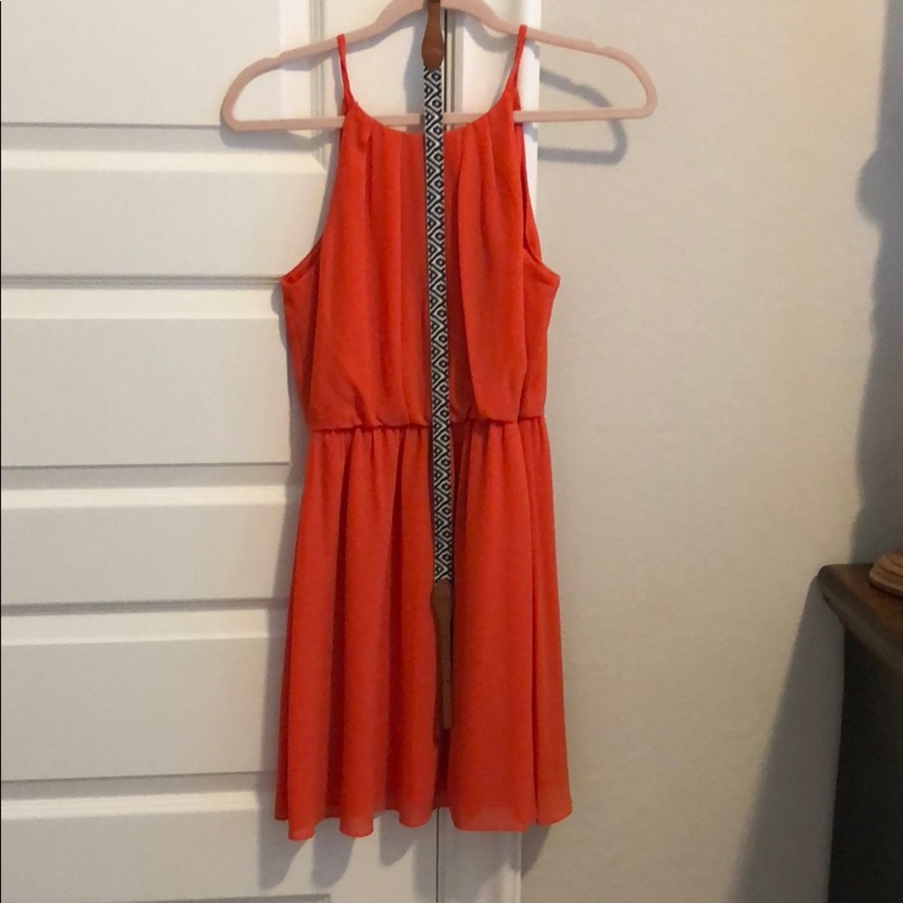 Fun summer dress can be worn with or without belt